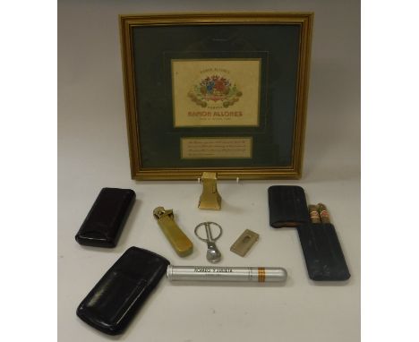 A Dunhill table lighter of flared form inscribed "Dunhill Made in England" to base, with textured design, approx 7 cm high, t