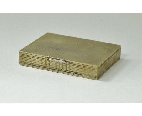 An early 20th Century 9 carat gold compact set with diamonds and sapphires, the outside with engine turned decoration, one si