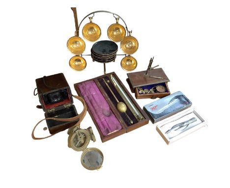 Group of collectables, including a set of scales, a 007 recording pen, a compass, a camera, a cased saccharometer and a set o