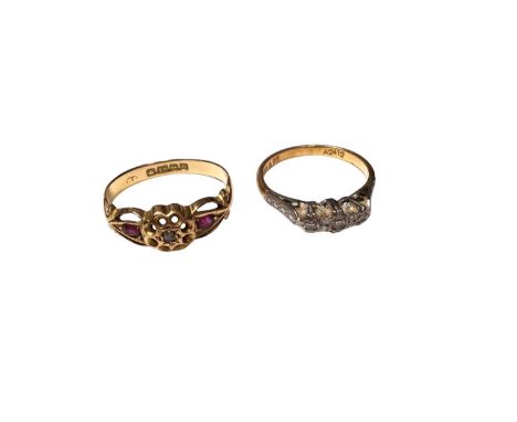 Antique 18ct gold diamond and ruby ring in a pierced flower head setting, size L½ and 18ct gold diamond three stone ring in a