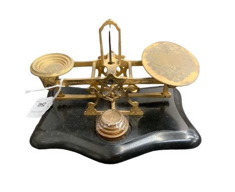 Pair Victorian gilt brass postal scales by S.Mordan &amp; Co, London with floral engraved decoration on shaped black slate pl