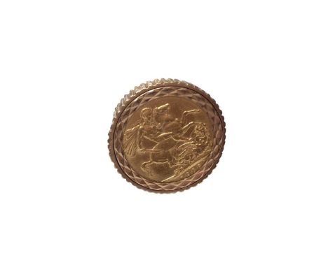 Edwardian gold full sovereign, 1909, in a 9ct gold ring mount, size XTotal weight 16.4 grams