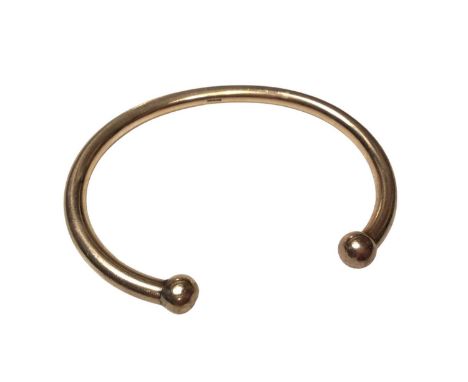 9ct gold torque bangle with ball terminals (Birmingham hallmarks)Weight 38.5 grams. The bangle feels very solid, not hollow. 