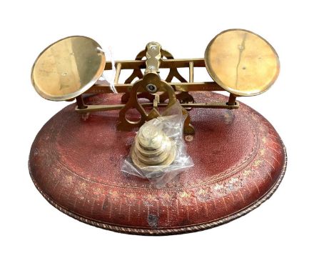 Pair good quality Victorian brass postal scales by S.Mordan &amp; Co, London on oval gilt tooled red leather base 21cm wide c