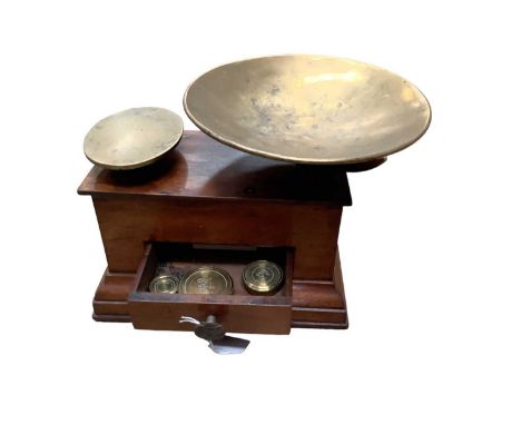 Set of Victorian brass and mahogany scales, the single drawer with ornate handle, Victorian registration mark, weights inside