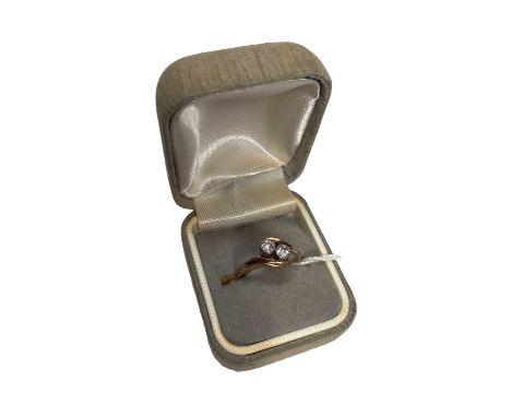 Diamond two stone cross over ring with two old cut diamonds, estimated to weigh approximately 0.10cts each, in a millegrain s