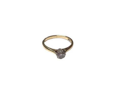 Diamond single stone ring with a certificated round brilliant cut diamond weighing 0.31ct, colour grade F and clarity SI, in 