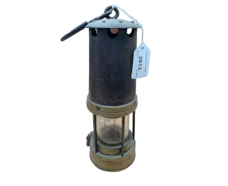 Antique brass miners lamp, numbered 588.