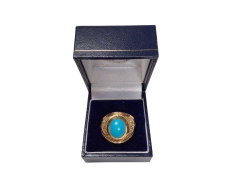 18ct gold American 1961 college ring with a large turquoise cabochon in a rub over setting and engraved designs to the should