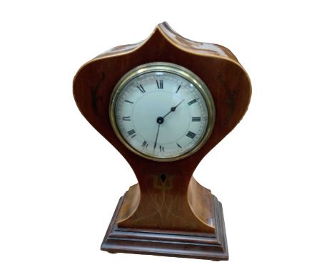Early 20th mahogany mantle clock with French movement in shaped Art Nouveau style case with brass inlaid decoration, key pres