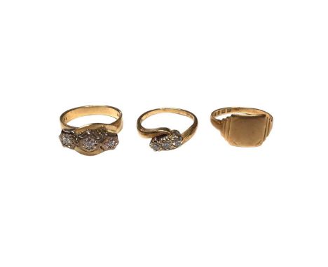Two 18ct gold diamond three stone cross over rings and an 18ct gold signet ring (3)Total weight 11.1 grams