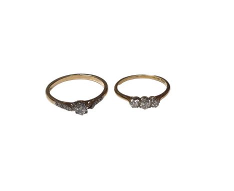 18ct gold and platinum diamond single stone ring with diamond set shoulders, size Q½ and an 18ct gold diamond three stone rin