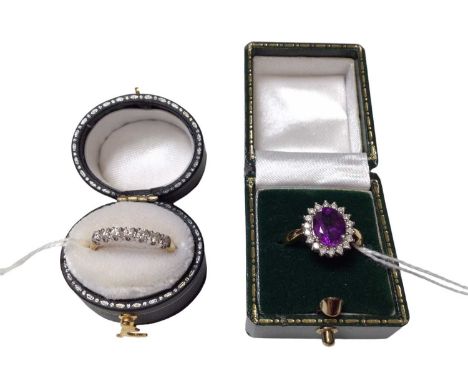 18ct gold diamond seven stone half eternity ring and 18ct gold amethyst and diamond cluster ring, both size M (2)Total weight