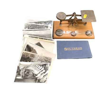 Group of postcards together with a set of brass postal / letter scales.