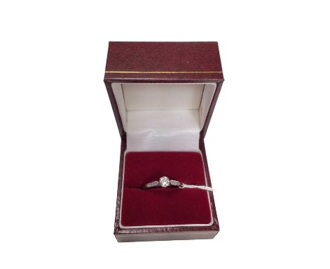 Diamond single stone ring with a brilliant cut diamond, estimated to weigh approximately 0.30cts, and further diamond set sho