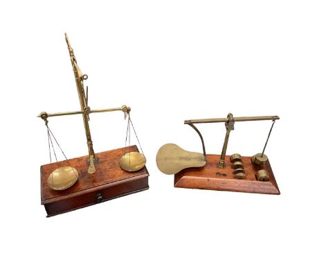 Set of antique Avery brass and mahogany beam scales with various weights inside, together with an unusual set of beam scales 