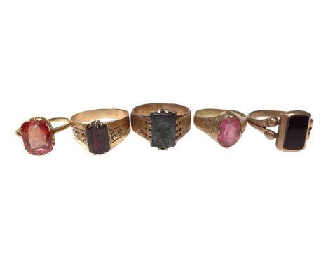Five Continental gold and gem-set rings including two stamped 585, Roman head signet ring and two othersTwo rings (orange cus
