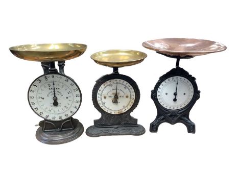 Three sets of Victorian and later scales, cast iron, brass and copper, with enamel dials, including Salter's Postal Parcel Ba