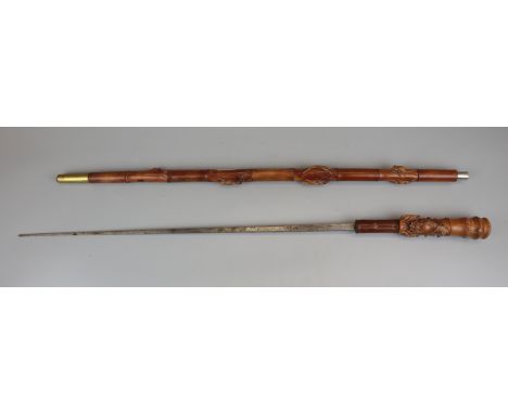 Sword stick adorned with insects 