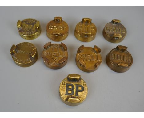 Collection of oil can caps to include Shell, Pratts and BP 
