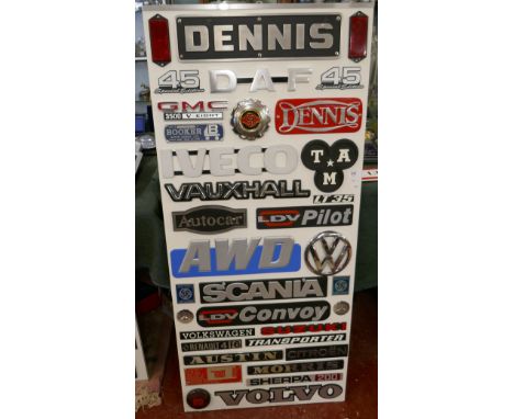 Collection of badges to include Dennis, VW, Vauxhall 