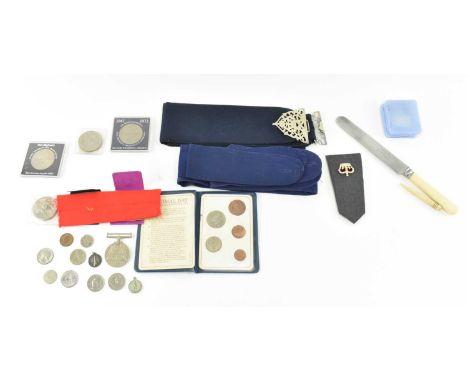 A 20th century EPNS nurses belt buckle on fabric together with epaulettes etc. Together with a 1939-1945 WW2 defence medal an