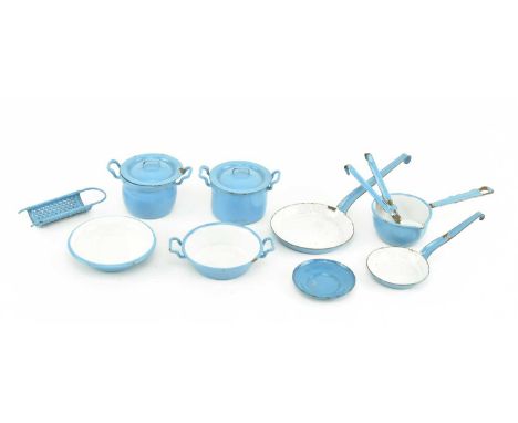 A collection of early to mid 20th century miniature dolls house kitchenware. The lot comprising two lidded pots, three saucep