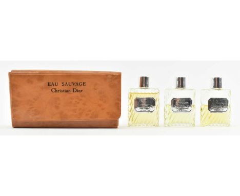 Christian Dior - Eau Sauvage - a vintage late 20th century set of three aftershaves. The aftershaves partially empty, present