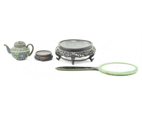 A group of four late 19th to early 20th century Japanese vanity items. The lot to include a cloisonne teapot decorated with f