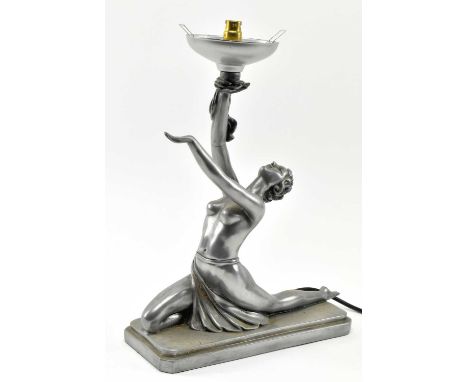 A vintage 20th century Art Deco style resin table lamp. The lamp modelled in the form of a dancer, hand outstretched holding 