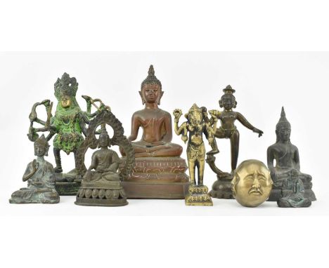 A collection of nine 20th century &amp; earlier Thai and Indian bronze figurines. The lot to include a copper Thai seated bud