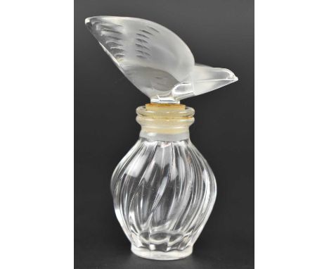 Lalique for Nina Ricci - A L'Air du Temps - a vintage late 20th century glass perfume bottle. The perfume bottle featuring fr