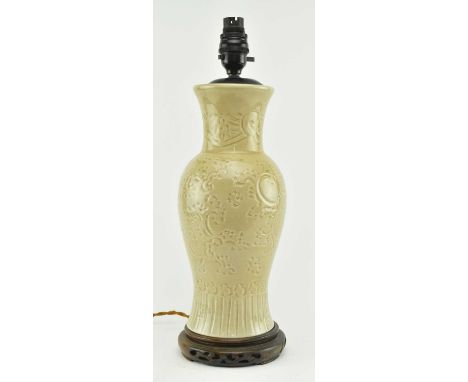 A vintage 20th century Chinese celadon ware vase converted to a lamp. The baluster vase with flared rim fitting with ebony li