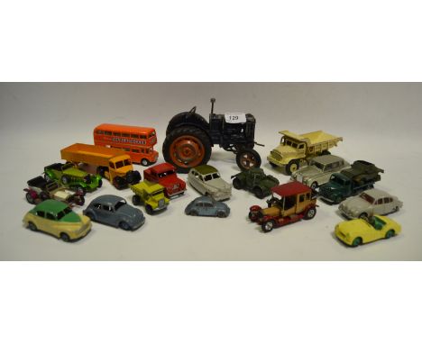 Toys - a die cast Fordson Tractor, blue livery, orange wheels, play worn; a Dinky Volkswagen Beetle, in powder blue; a Dinky 