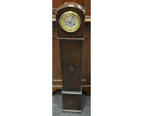 An Art Deco mahogany 'Andrew' granddaughter clock, Arabic numerals on a brushed steel and enamel dial, twin train movement st