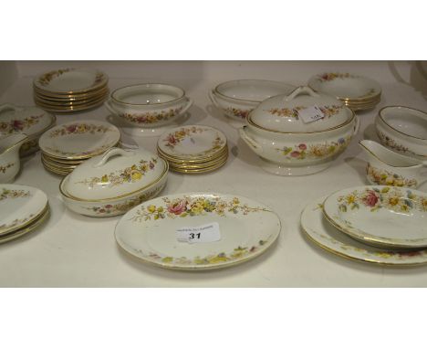 A miniature dolls dinner service late 19th Century earthenware to include six dinner plates, two lidded tureens, large lidded