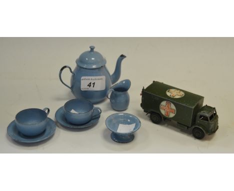 A French enamel child's tea set; a Dinky die cast Military ambulance