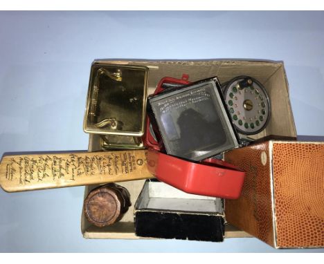 Box to include fly reels, a carriage clock, treen snuff box, local slides etc.