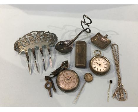 A silver comb, two pocket watches etc.