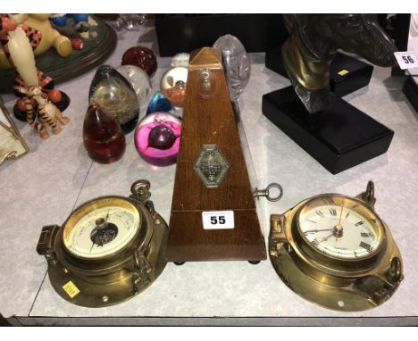 A metronome, modern ships clock and barometer