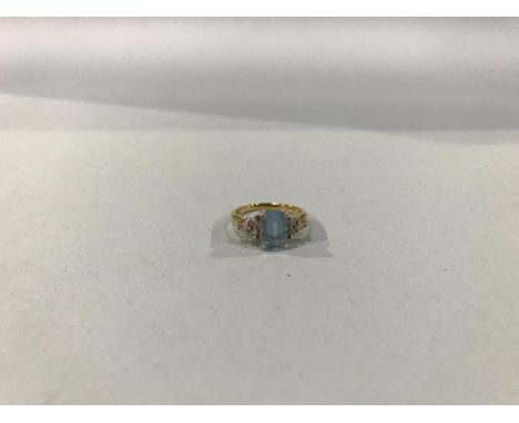 An 18ct diamond and aquamarine ring, 4g, size 'K/L'