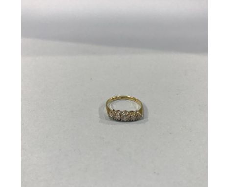 An 18ct gold and diamond ring, 2.2g, size 'K'