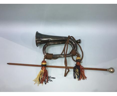 A bugle and a swagger stick