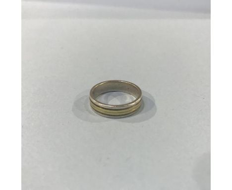 A silver and gold ring