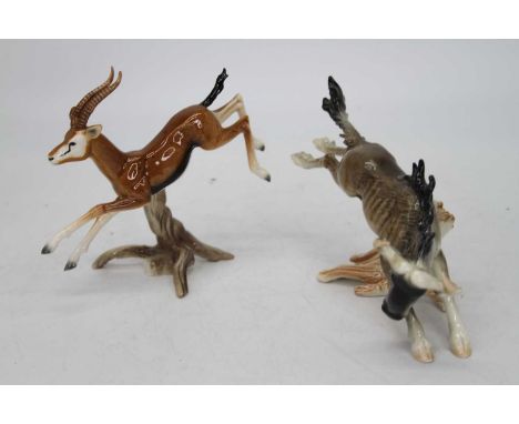 A Goebel figure of a leaping Springbok having printed mark verso and impressed 36301, height 14cm, together with one other Go