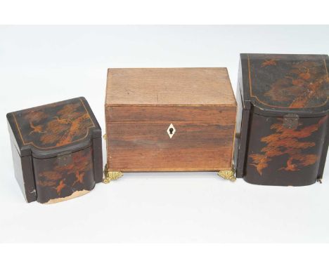 A 19th century rosewood tea caddy standing upon four gilt metal feet, width 21cm, together with two Japanese black lacquered 