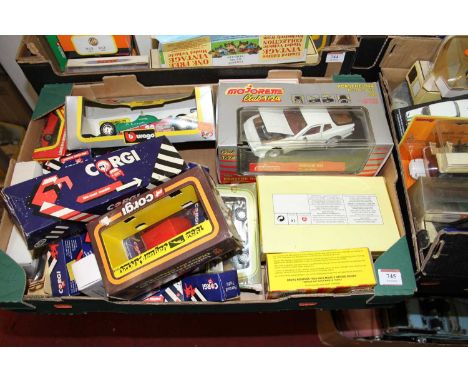 A collection of diecast model vehicles to include Corgi, Bburago, and Majorette