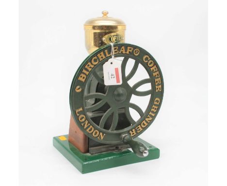 A green painted cast iron coffee grinder, inscribed Birchleaf Coffee Grinder London, h.29cm