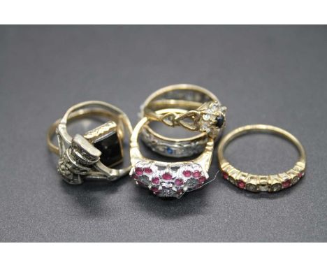 Assorted 9ct gold dress rings, to include black onyx example, diamond point and ruby example, blue and white sapphire eternit