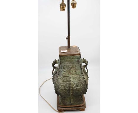 A Chinese verdigris metal table lamp, of archaic form, height including fittings, 83cm